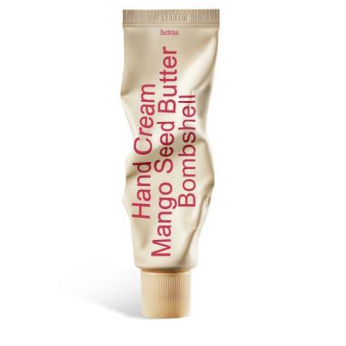Hetras mango seed butter hand cream in Bombshell scent, 50ml tube with moisturizing formula