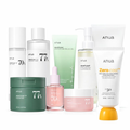 ANUA 9-step Korean skincare set with cleansers, toner, pads, serum, cream, lotion and sunscreen bottles
